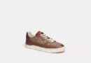 COACH - CLIP COURT SIGNATURE SADDLE HOMBRE