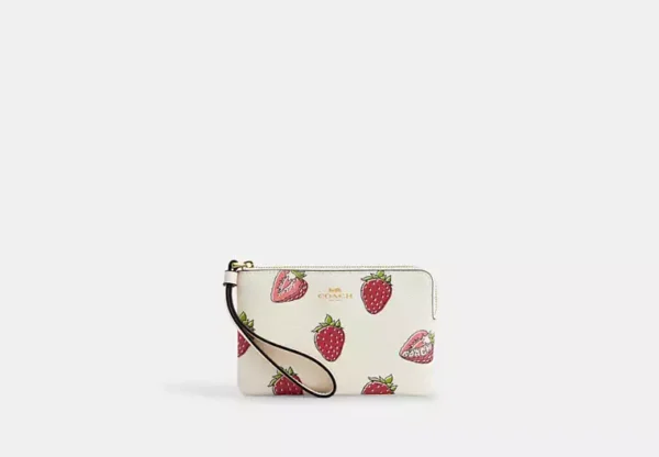 COACH CORNER ZIP WRISTLET - CHALK/FRESAS