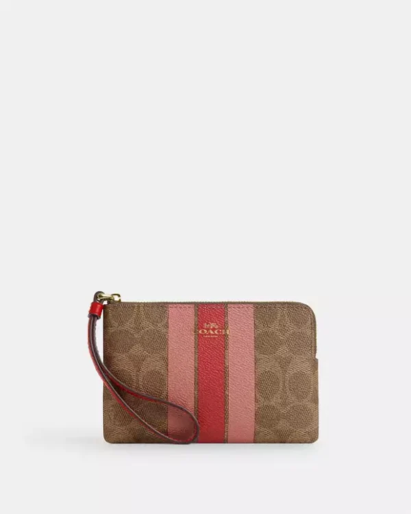 COACH CORNER ZIP WRISTLET IN SIGNATURE CANVAS WHIT STRIPE - GOLD/TAN