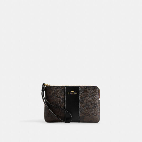COACH CORNER ZIP WRISTLET IN SIGNATURE CANVAS WITH STRIPE