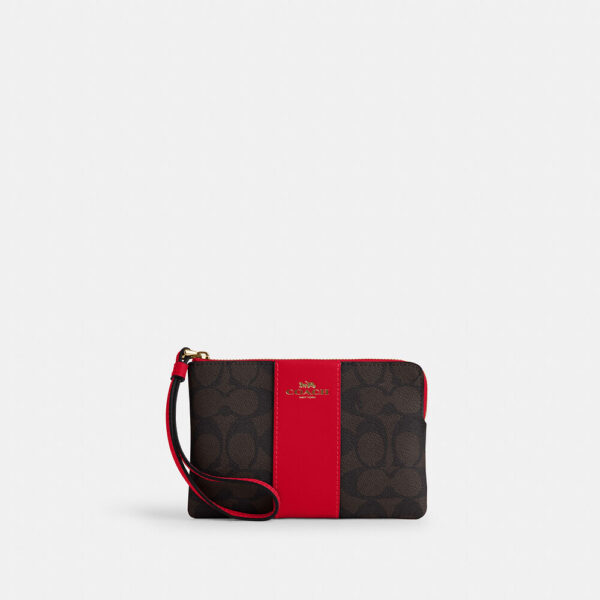 COACH CORNER ZIP WRISTLET IN SIGNATURE CANVAS WITH STRIPE - Imagen 4